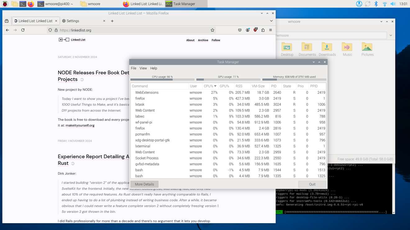 Screenshot from Raspberry Pi 400 showing the desktop with Firefox, file manager, terminal, and task manager running